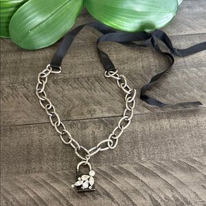 Tumi Lock with Silver Chain and Black Ribbon Necklace